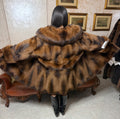 Stinktierpelzjacke
